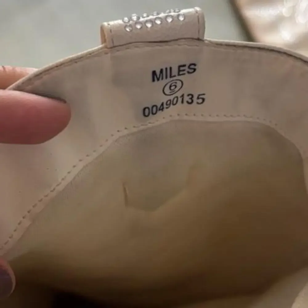 Miles cream cowboy boots with